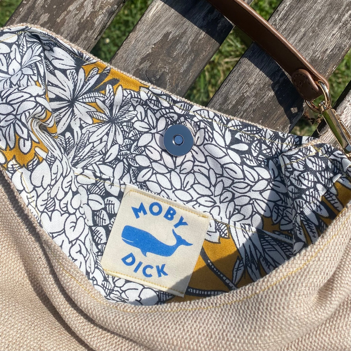 Bolso natural con asa de cuero