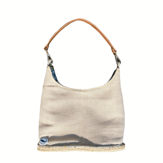 Bolso natural con asa de cuero