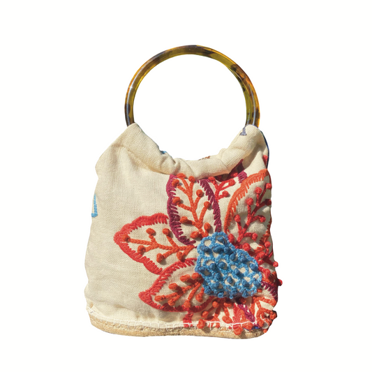 Bolso bordado con asa de carey